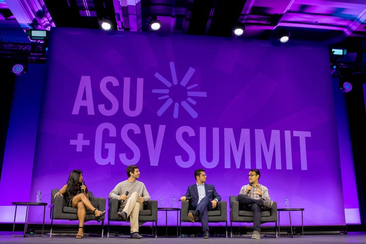 Four speakers sit onstage at the ASU+GSV Summit in front of a bright purple background.