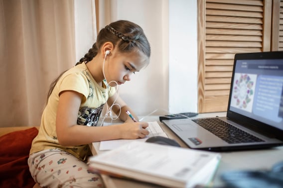 Young student distance learning on laptop