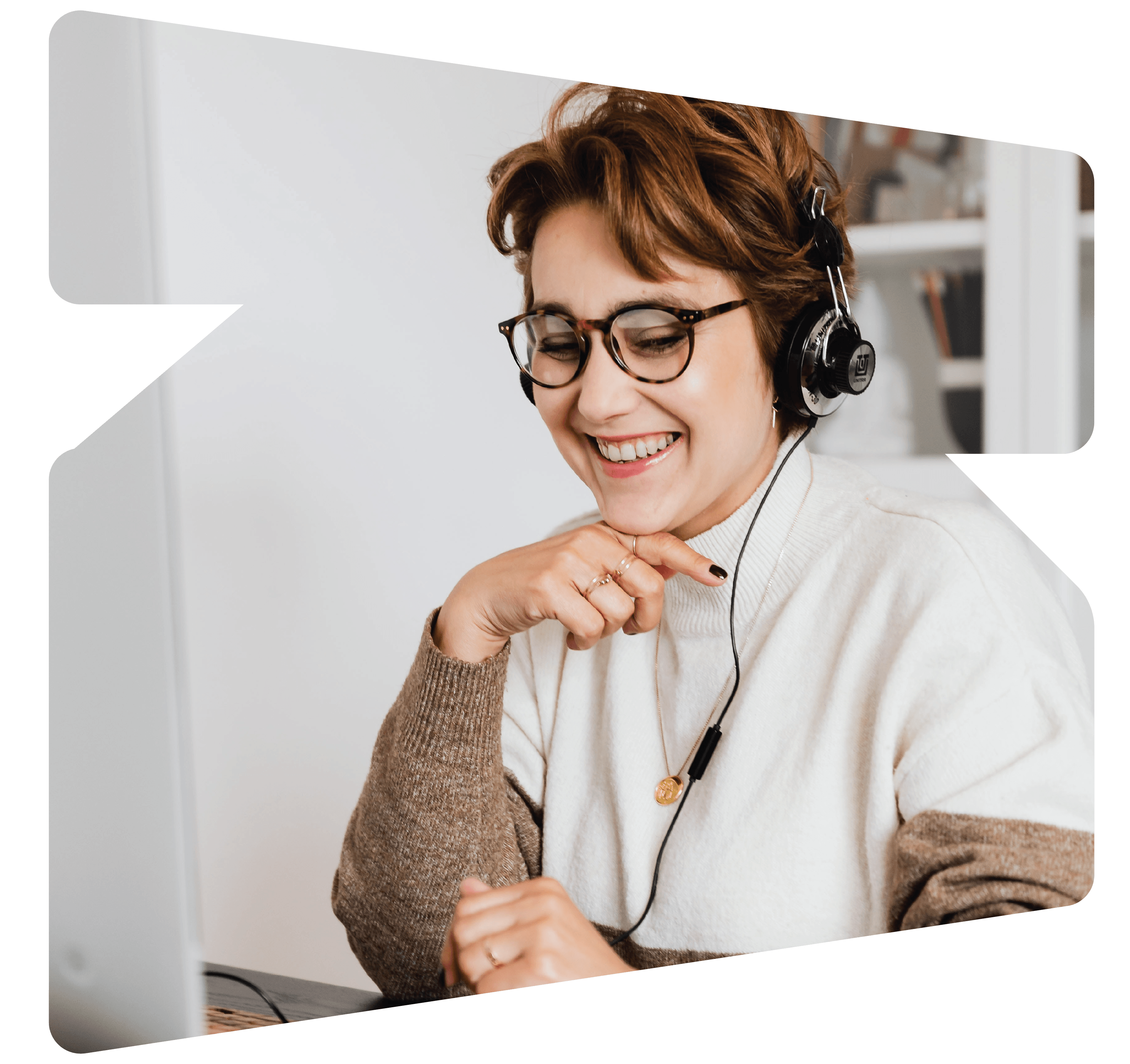 Woman wearing headphones and smiling