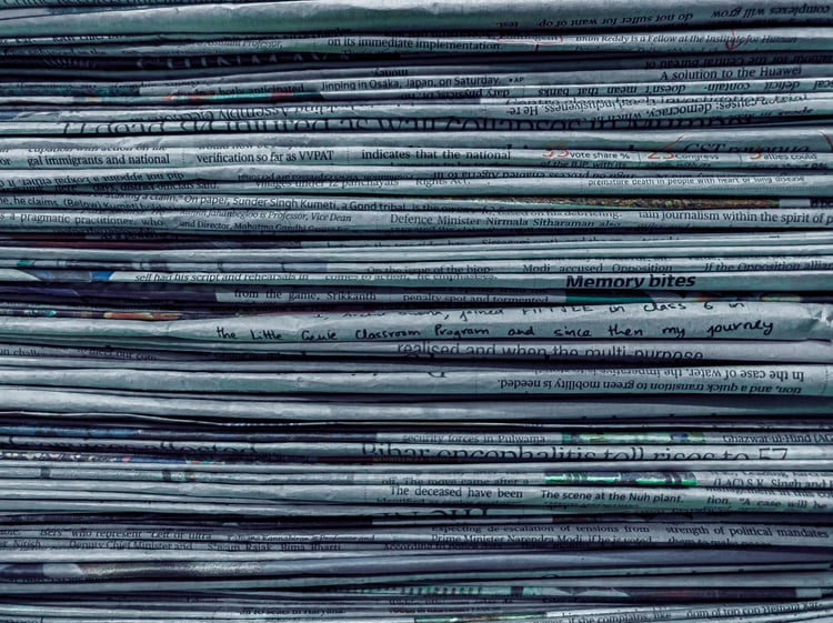 Close-up of a stack of newspapers